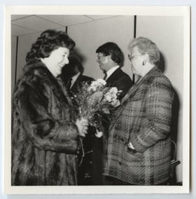 Three unidentified individuals