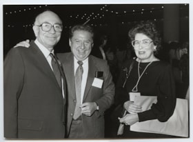 Mendel Good, John Greenberg, and Gladys Greenberg pose for a photo at the Canadian Gathering of Jewish Holocaust survivors and their children