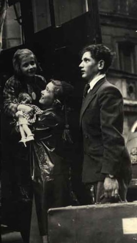 War Orphans Project /Paris transit - 3 children at door of bus. This is a cropped version of the original photo. Identifying information is with the original in the Joint Distribution Committee Photo collection, PC04