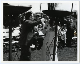 2 men lighting a flare at Yom Hashoa, May 6 1979
