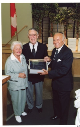 Unidentified woman with Norman Lesh and Saul Goldfarb at an Ottawa Jewish Community Foundation annual general meeting.