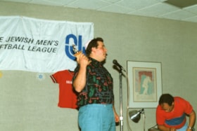 Unidentified man speaking at a Jewish Mens Softball League award night