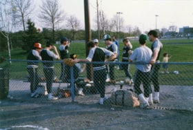 Mastercraft softball team standing on a baseball diamond