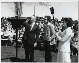3 people lighting a flare at Yom Hashoa, May 6 1979