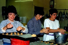 Vivian Astroff, Adele Sydney and Carol Pascoe working in the kitchen at the Ottawa Hadassah-Wizo Bazaar.