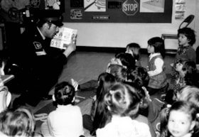 Hillel Academy's central nursery school receving a safety lesson from an Ottawa police officier.
