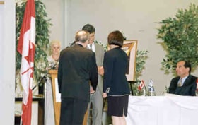 Ambassador David Sultan of Israel and his wife, Adina, receiving a print from Stephen Greenberg at the Jewish Community Council of Ottawa Annual General Meeting.