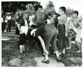 Group portrait of campers getting dressed after a swim, Camp Wooden Acres, Montreal.