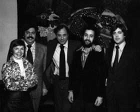 CJC-Samuel Bronfman House Staff/Alan ROSE, Steve AIN, Stan URMAN, A. KING, Murray BRASS, in front of tapestry by Joyce Rose