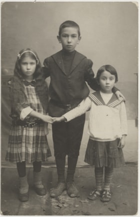Portrait of boy and two girls